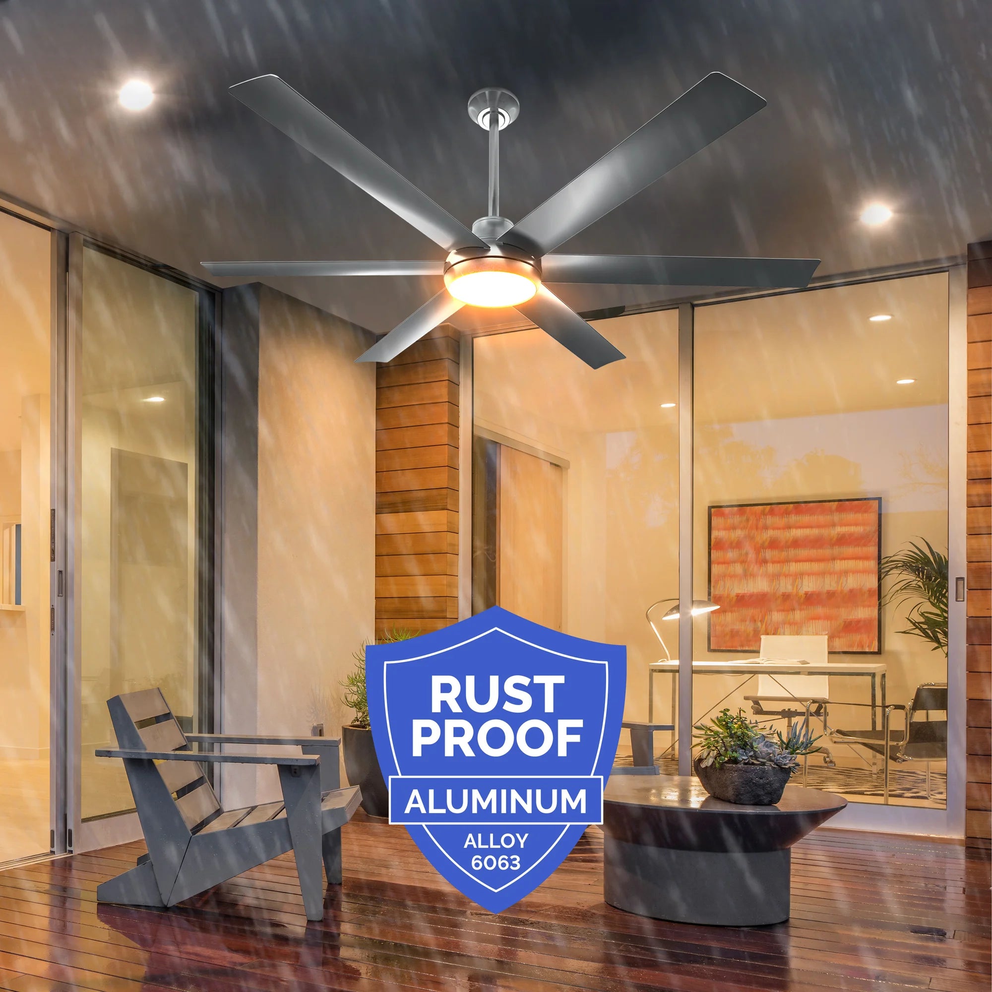 Bresio Ceiling Fan running in heavy rain under a covered patio, highlighting rust-proof construction; includes a blue badge that reads "Rust Proof Aluminum Alloy 6063."
