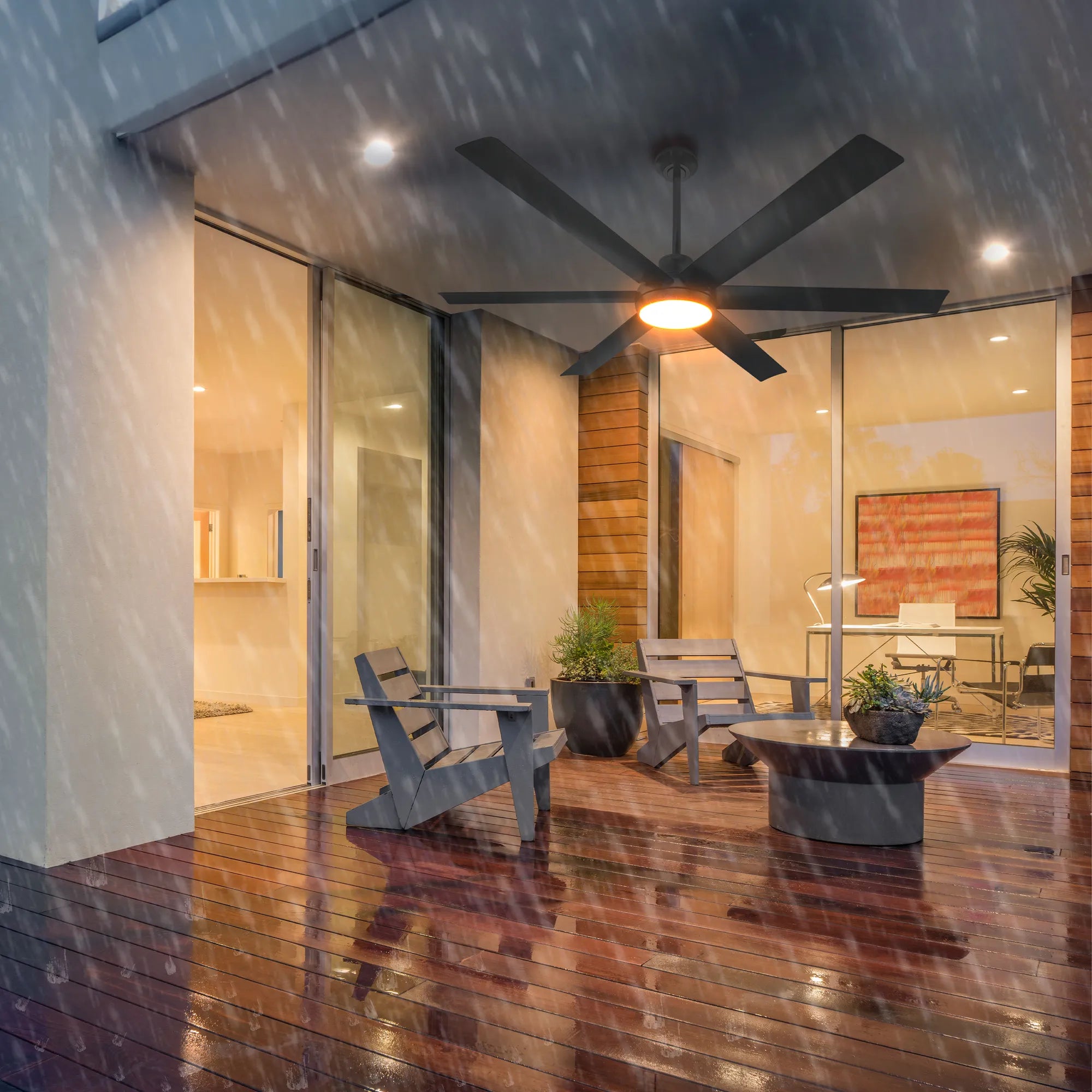 Bresio 60 Inch Smart Outdoor Ceiling Fan installed in a modern deck, on a rainy day 